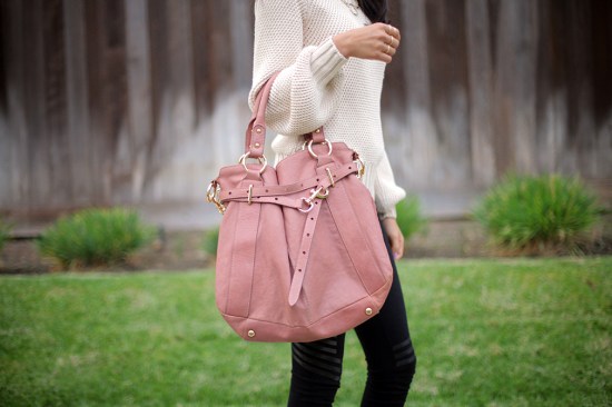 catching couture tarah smith leather purse with gold hardware carolina herrera knit sweater